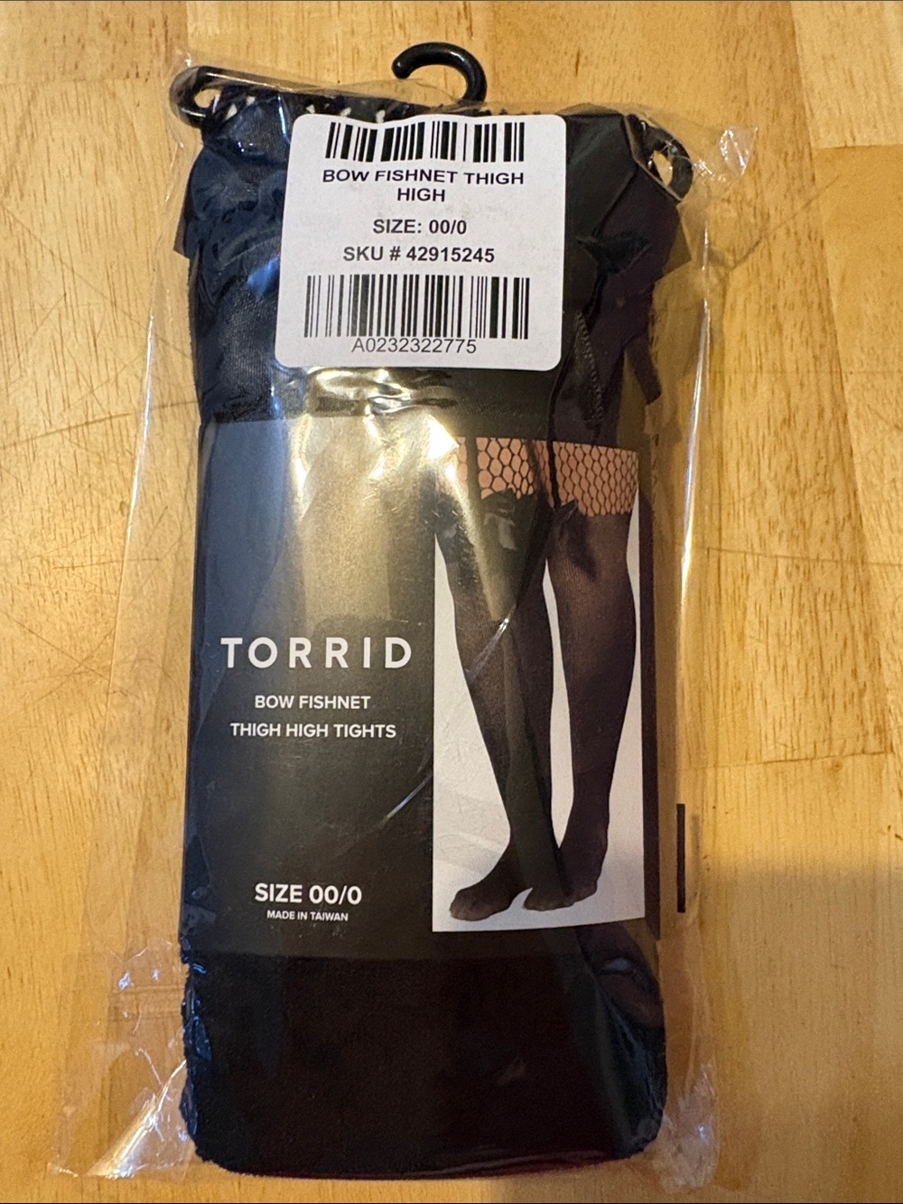 torrid Black Bow Fishnet Thigh High Tights